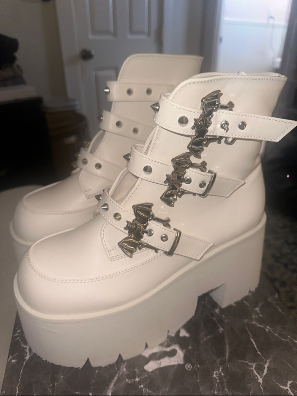 DEMONIA White Platform Lace-Up Ankle Boots with Buckle Accents